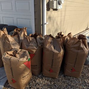 Compostable bags of leaves and debris